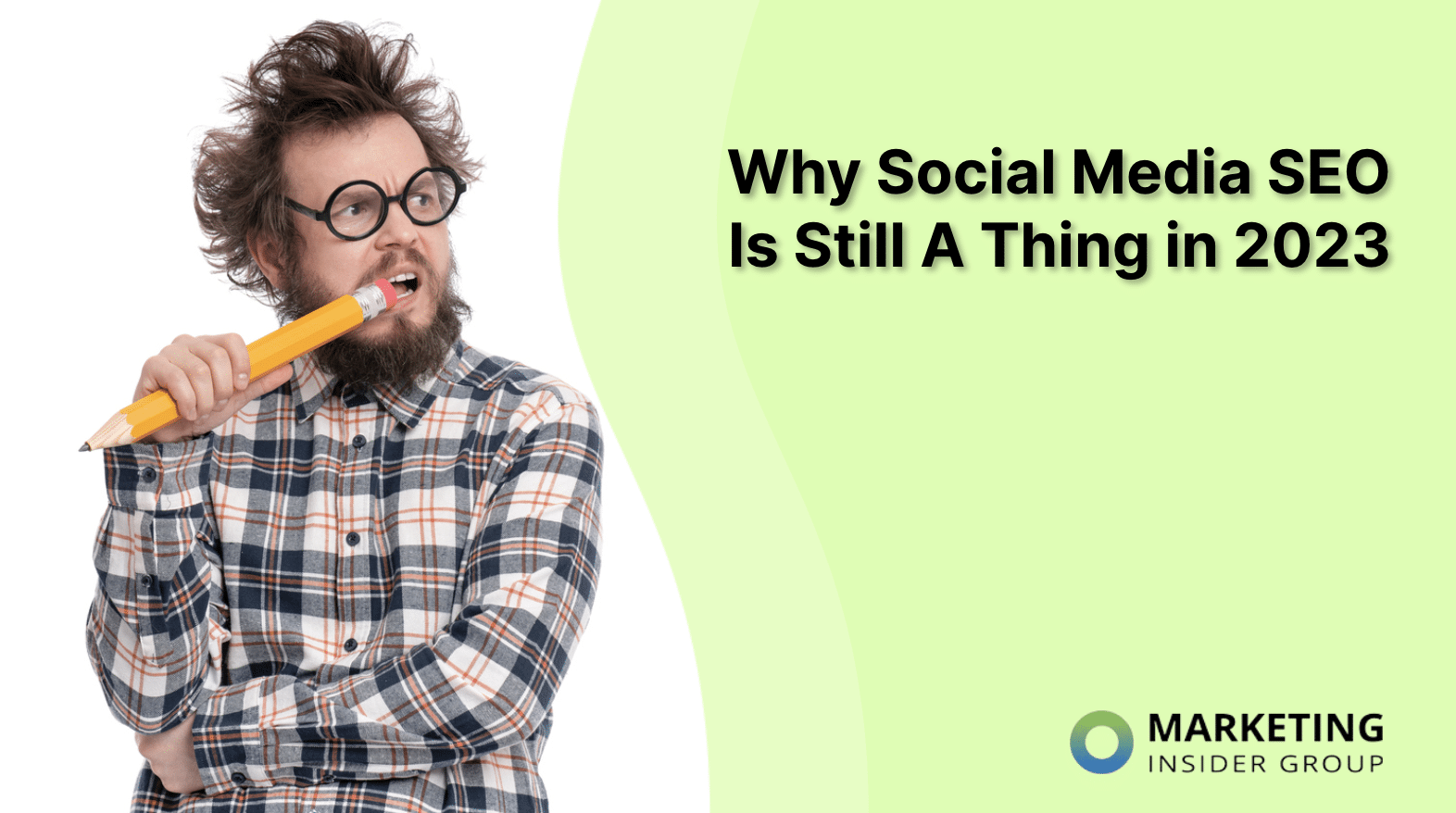 bearded Man in plaid shirt wonders why social media SEO is still a thing in 2023